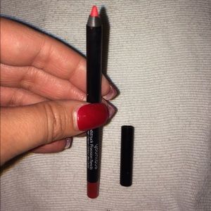 Younique Red Lip liner in the shade of Popular